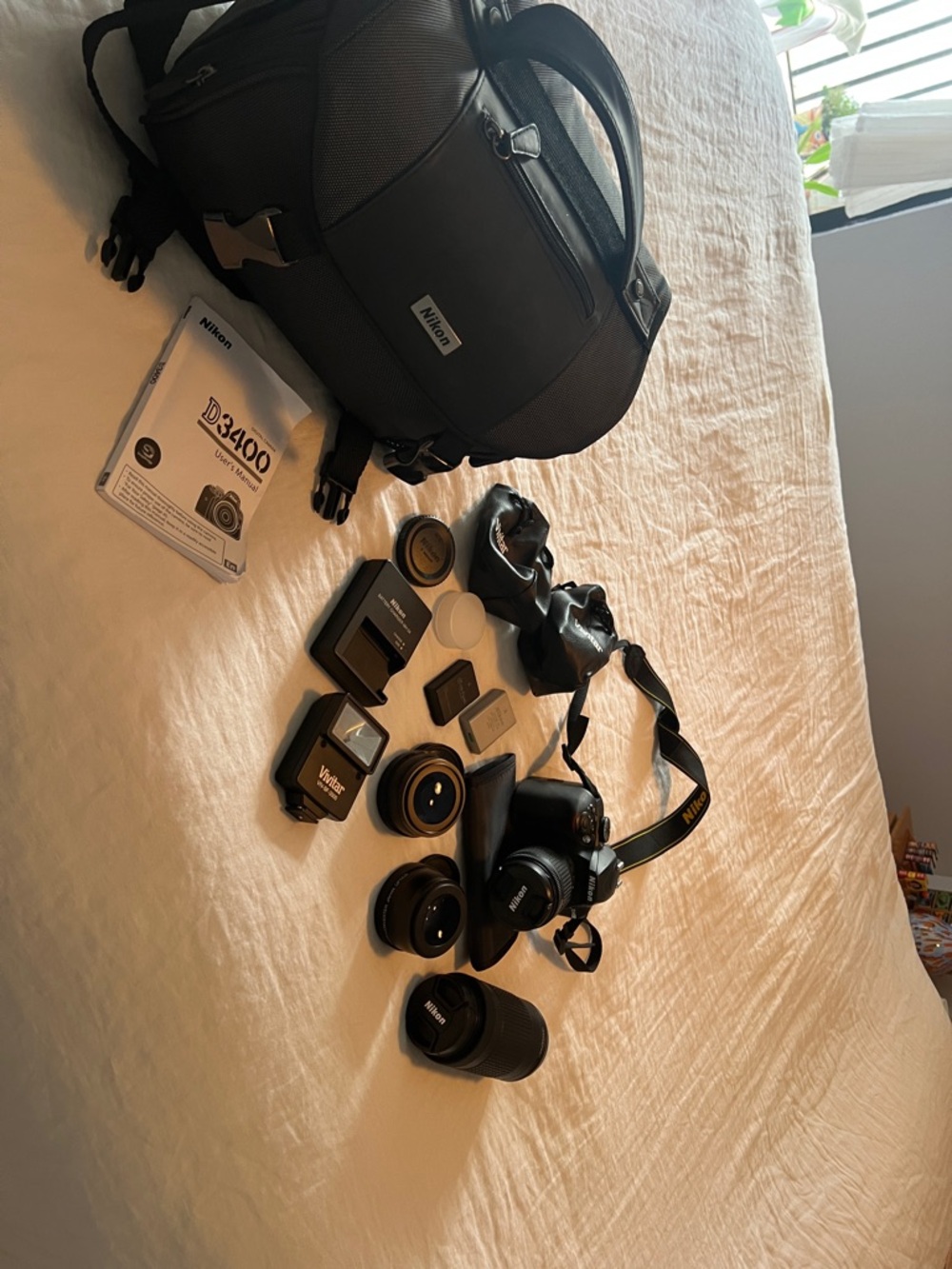 Nikon DSLR Camera Kit in Black with Multiple Lenses and Accessories